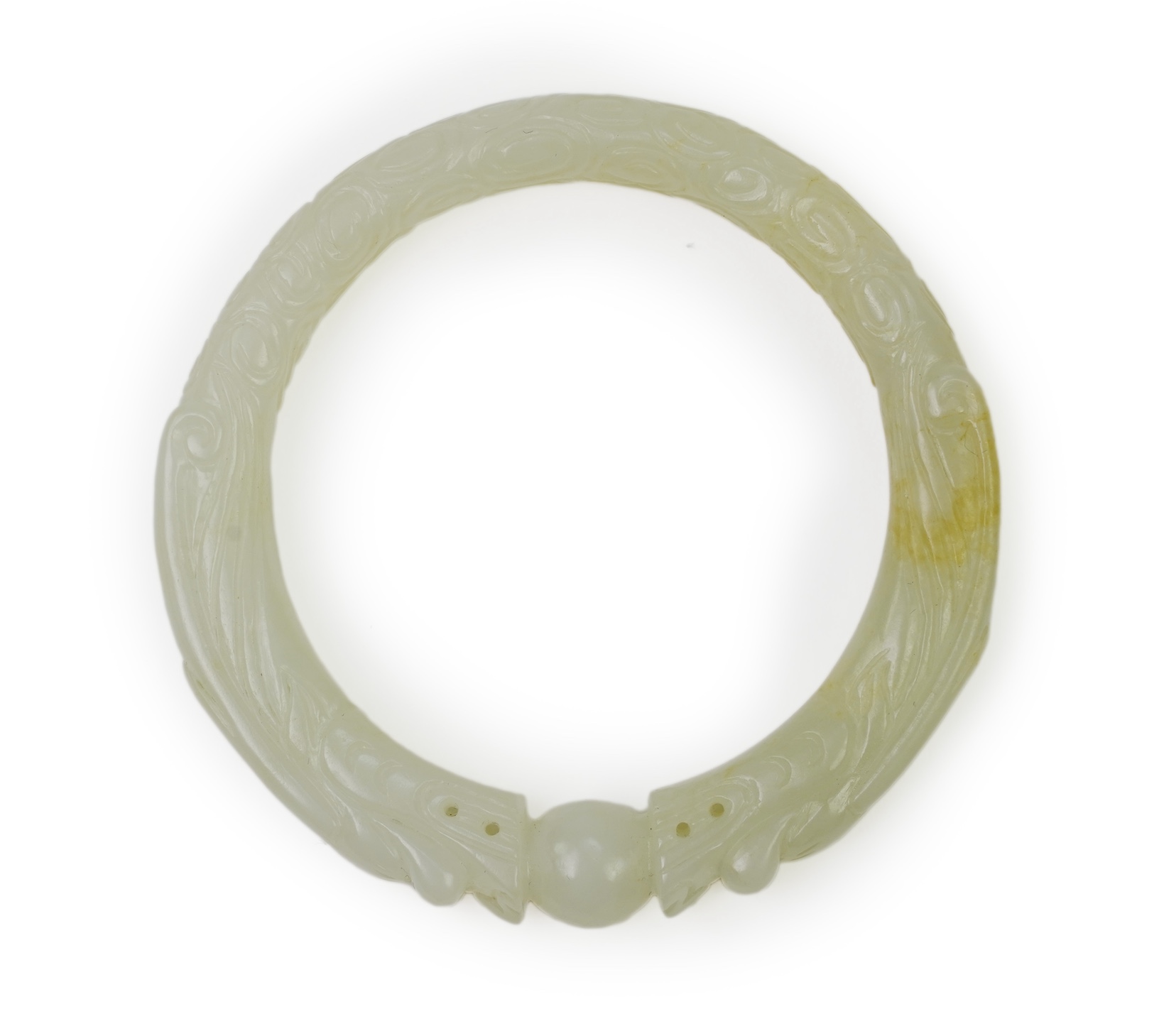 A Chinese pale celadon jade ’dragon’ bangle